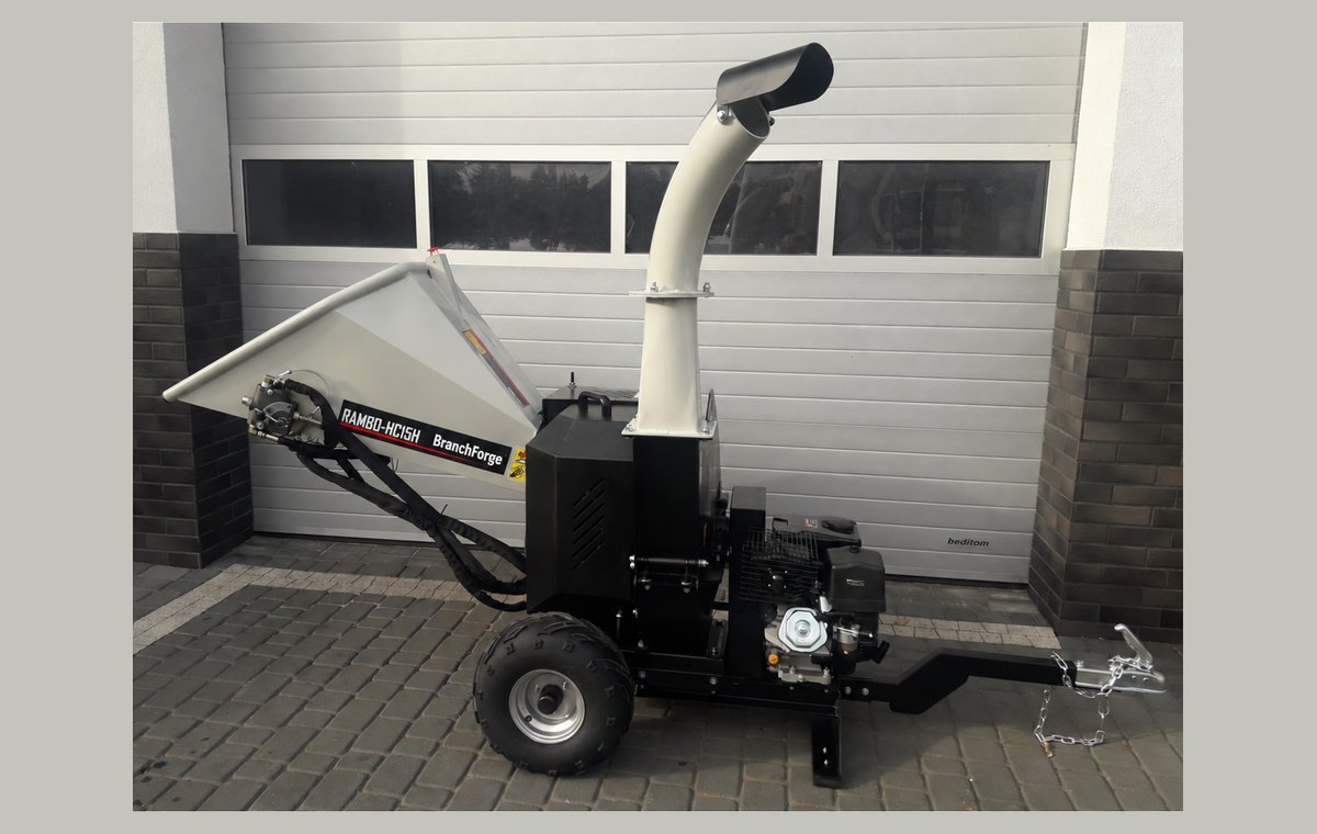 HC15H side view showing the road-towable chassis and hitch